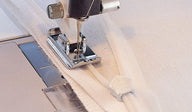 Piedino Husqvarna per cerniera invisibile - Cucireonline