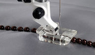 Piedino Husqvarna per perline 4mm - Cucireonline