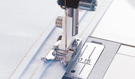 Piedino Husqvarna con lamella laterale - Cucireonline