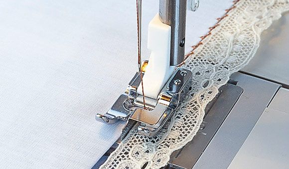 Piedino Husqvarna con lamella centrale - Cucireonline